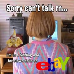 the back of a woman's head in front of a computer screen with an ebay ad on it