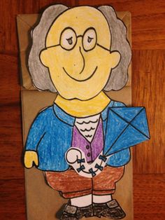 a paper bag with a drawing of an old man holding a kite on top of it