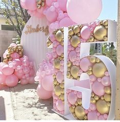 balloons are arranged in the shape of letters and numbers