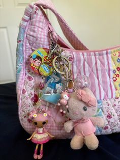 #trinkets #lalaloopsy #hellokittycollection #hellokitty #japan Bag With Trinkets, Purse Trinkets, Bags On Wall, Bag Trinkets, Lalaloopsy Aesthetic, Weird Bags, Trinkets Aesthetic, Cute Trinkets, Purse Decor