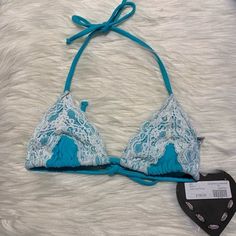 Turquoise Blue Bikini Top With White Lace Accents!! Brand New, Never Worn, Price Tags Attached!! Blue T-back Swimwear For Beach Party, Beachy Triangle Top Turquoise Swimwear, Turquoise Triangle Top Swimwear For Summer, Turquoise Triangle Top Beachwear, Turquoise Triangle Top Swimwear For Pool, Turquoise Triangle Top Swimwear, Light Blue Triangle Top Swimwear Bra Friendly, Blue T-back Swimwear For Beach, Tie Dye Swimsuit