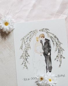 a wedding card with a watercolor painting of a bride and groom holding each other