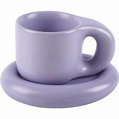 a cup and saucer sitting on top of each other