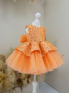 Orange Baby Dress, Shinning Party Dress, Sparkling Dress, Dressy Girl Gown, Birthday Girl Dress, Party, Graduation Gown, Flower Girl Dress, Puffy Gown, Toddler Dress, Big Bow Dress, First Birthday Cute sparkling baby girl dress have very original fashionable design will be perfect for any celebration....birthday, wedding, parties, Christmas, photography, Valentine's Day, dance, evening, flower girl  dress, ball gown, festivals wear, dance, dress-up, fairy & princess costumes or other special occasional events.    All our dresses are made with great love and care. We stand behind our work. Highest quality and 100% satisfaction guaranteed service. We proudly believe in our product's softness, durability and quality, fashion and lovely Features: - knee length  - one shoulders, one sleeve - cl Orange Princess Dress Kids, Baby Gown Styles, Baby Gowns Party Wear, Puffy Gown, Baby Girl Gown, Fairy Princess Costume, Big Bow Dress, Gown Birthday, Birthday Princess Dress