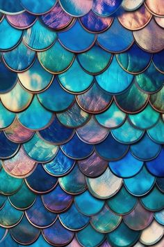 an image of blue and green scales on a wall or floor in the shape of fish scales