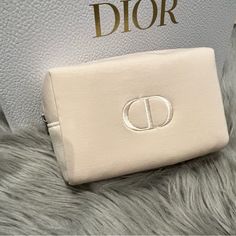 Brand New Without Tags. Christian Dior Cosmetic Pouch In Cream. Chic White Pouch Cosmetic Bag, Chic White Cosmetic Bag, Makeup Bag Dior, Luxury White Pouch For Daily Use, Chic White Pouch With Dust Bag, Christian Dior Makeup Bag, Dior Cosmetic Pouch, Travel Pouch Dior, Dior Caro Zipped Pouch With Chain