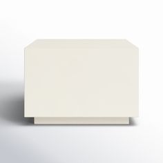 an empty white box sitting on top of a table