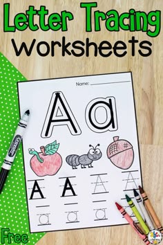 the letter worksheet is on top of a table with crayons and markers