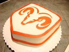 a cake with an orange and white design on it