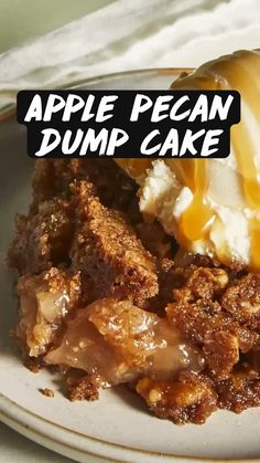 an apple pecan dump cake on a plate with ice cream and caramel drizzle