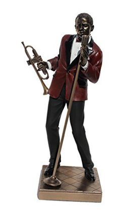 a statue of a man with a trombone in his hand and wearing a tuxedo