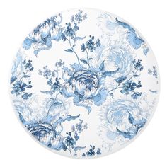 a blue and white plate with flowers on it