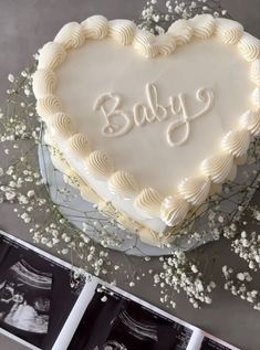 a heart shaped cake with baby's breath written on it