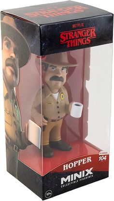 Jim Hopper is the Chief of Police of the town of Hawkins, Indiana. After an old friend comes to him for help after her son goes missing, he is drawn deeper and deeper into a mystery surrounding the local Hawkins National Laboratory. Stranger Things Toys, Stranger Things Hopper, Holding A Cup Of Coffee, Hopper Stranger Things, Stranger Things Gifts, Stranger Things Tv Series, Lucas Stranger Things, Stranger Things Merch