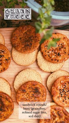 some breads are sitting on a cutting board with the words grain free written above them