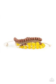 Strands of glassy yellow cat's eye beads stand out in an earthy collection of wooden beads and braided twine, giving a polished flair to the natural homespun look as it stacks up the wrist. Features an adjustable sliding knot closure.P> Sold as one individual bracelet. Sliding Knot Bracelet, Adjustable Sliding Knot, Sliding Knot Closure, Lace Weave, Yellow Bracelet, Turquoise Bead Bracelet, Yellow Cat, Knot Bracelet, Eye Beads