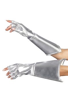 a woman wearing silver gloves with her arms outstretched