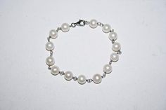 Vintage genuine white pearl bracelet with a sterling silver clasp. See photos for measurements. White Pearl Bracelet, Scottsdale Az, White Pearl, Pearl Bracelet, Pearl White, Silver Bracelet, Jewelry Bracelets, Pearl Earrings, Beaded Bracelets