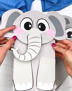 Learn how to turn a paper bag into an elephant puppet! This craft is perfect for kids of all ages. It's easy, fun, and inexpensive! You can use this craft as part of your zoo animal unit study or just during the week of April 8th when it's National Zoo Lovers Day. Get creative with different colors too! Download the free printable template and make it at home, in the classroom, at the library, or at daycare! Zoo Animal Crafts, Elephant Crafts, Hand Crafts For Kids, Animal Crafts For Kids, Paper Plate Crafts, Classroom Crafts