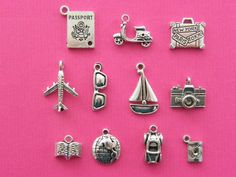 a collection of travel charms on a pink background with the words passport written below them