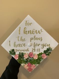 a graduation cap decorated with flowers and the words for i know the plans i have for you