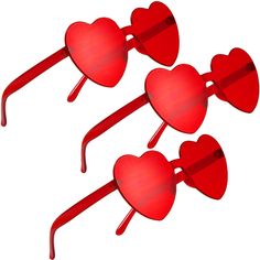 two red heart shaped sunglasses are shown on a white background