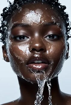 ↑↑↑ Larger size on website 🔸 A close-up portrait of a young woman with dark skin and curly hair. Her face is wet, with water casc Water On Face, Woman With Curly Hair, Close Up Portraits, Eyes Closed, Dark Skin Women, Her Eyes, Young Woman, Curly Hair, Close Up