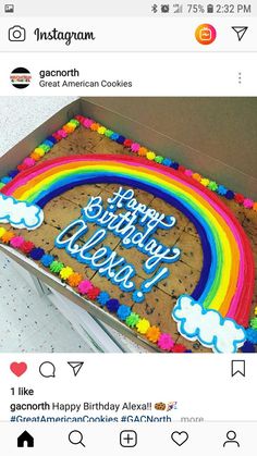 the birthday cake is decorated with rainbows and stars on it's side, which reads happy birthday dean