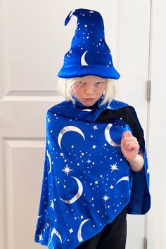 Your little Merlin will be ready to cast magical spells with their new Royal Blue Wizard Hat. Ages 3-8 Stunning moon and star design, sure to capture their imagination Interior made with high quality, soft foam covered by stretch velvet Measures 11" tall Matching Wizard Cape sold separately Conjuring Spells, Wizard Cape, Blue Wizard, Magical Spells, Wizard Hat, Foil Design, Star And Moon, Star Design, Stretch Velvet