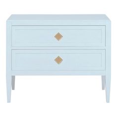 a white dresser with two drawers and gold handles