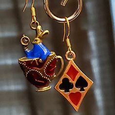 Alice In Wonderland Earring Collection. Pair #2. Gold Plated Sterling Silver Hooks. Brand New And Packaged. Earring Collection, Earrings Collection, Gold Plated Sterling Silver, Alice In Wonderland, Red Blue, Red And Blue, Gold Plate, Jewelry Earrings, Women Jewelry