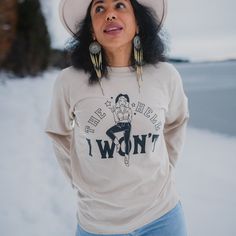 The Hell I Won't Unisex Pullover - Sand - The Montana Scene Beige Graphic Print Top For Winter, Fall Cream Graphic Print Tops, Winter Graphic Print Cream Tops, Winter Cream Tops With Graphic Print, Winter Cream Graphic Print Tops, Cowgirl Graphic, Quirky Style, Fit Body, Round Up