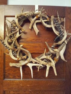 an antler wreath made out of deer horns