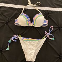 Victoria’s Secret White Bikini Set. 34b Top And X-Small Bottoms. Never Worn/Used. Has Been Washed So No Tags Or Liners. Top Has Padding And Bottoms Can Be Tighten Or Loosened With String Ties. White Tie-side Bottom Swimwear For Vacation, White Tie-side Swimwear For Vacation, White Fitted Beachy Swimwear, Fitted White Beachy Swimwear, White Fitted Triangle Top Swimwear, Fitted White Triangle Top Swimwear, Fitted White Swimwear For Beach Party, Fitted White Tropical Swimwear, White Tropical Triangle Top Swimwear