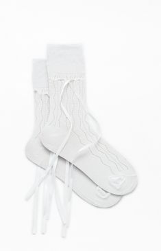 Add a playful twist to your outfit with the Ribbon Bow Socks from PacSun. Made from soft knit fabric, these socks feature charming ribbon ankle details that add a touch of sweetness to your look. Whether you're dressing up or keeping it casual, these socks are the perfect accessory to elevate your look.


	Solid color socks
	Knit fabric
	Ribbon bow details
	One size fits most Ribbon Socks, Coquette Socks, Coquette Socks Aesthetic, Socks Bow, Coquette Knee Socks, Knee High Bow Socks, Colorful Socks, Big Bows, Fabric Ribbon