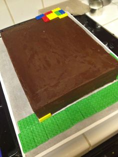 a chocolate cake sitting on top of a stove