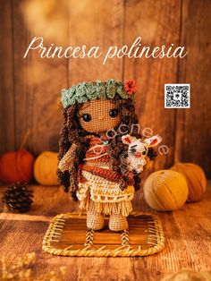 a small doll is standing on a mat with pumpkins and pine cones in the background