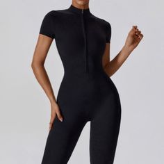 Details: Style: Sporty Fit: Slim Fabric: Nylon Pattern: Solid Element: Zipper Neckline: Stand Collar Sleeve Type: Regular Sleeve Length: Short Sleeve Pant Length: Full Main Composition: Nylon Product Code: 51168 Size Chart: Casual Stretch Activewear With Zipper Closure, High Stretch Black Bodysuit With Zipper Closure, Stretch Bodysuit With Zipper Closure, Black Stretch Activewear With Zipper Closure, Casual Stretch Moisture-wicking Bodysuit, Sporty Fitted Black Jumpsuits And Rompers, High Stretch Black Jumpsuits For Sports, Casual Stretch Elastane Unitard, High Stretch Black Jumpsuits And Rompers For Sports