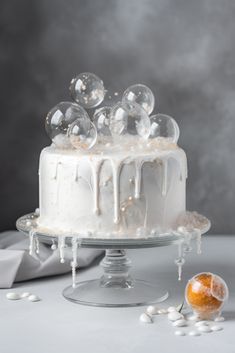 a frosted cake with icing and bubbles on top