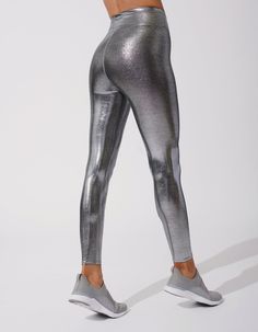 Make a statement with the iridescent fabric of the Marvel Legging. Marvel at the sheen on this legging and feel powerful and pretty at the same time. Show off at the gym or on the street. Pairs well with the matching Convertible Bra. Metallic fabric. High waistband lined with power mesh Self: 80% NYLON 20% SPANDEX Iridescent Fabric, Feel Powerful, Convertible Bra, Closet Essentials, Metallic Fabric, Large Dress, Best Leggings, Mesh Long Sleeve, At The Gym