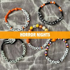 Introducing our spooktacular Handmade Friendship Bracelet Set, specially crafted to add a touch of eerie elegance to your Halloween Horror Nights experience! These bracelets are more than just accessories; they're tokens of friendship that embrace the spirit of the season. Grab a set for your Scream Squad or to trade with your fellow horror fans! 🎃 Frightful Fashion: Each bracelet in this set of 5 features a nod to Halloween Horror Nights. Set includes Our Gourd and Savior (Lil Boo), Never Go Alone, Where Horror Lives (w/ skeleton hand charm, Horror Nights, and Horror Nights (with Bat Charm). These bracelets are sized for adults and feature an elastic cord so that anyone can wear them! 🕷️ Share the Scares: Designed for you and your favorite ghouls, this set comes with multiple bracelets Beaded Scream Bracelet, Horror Bracelet Ideas, Halloween Horror Nights Bracelets, Edgy Halloween Bracelet, Halloween Novelty Bracelet, Halloween Novelty Orange Bracelets, Multiple Bracelets, Horror Nights, Handmade Friendship Bracelets