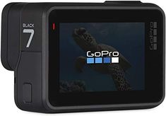 the gopro hero 7 black camera is shown with its screen showing an image of a turtle