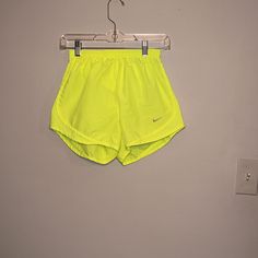 Never Worn Nike Shorts Size Small Nike Stretch Bottoms For Spring, Sports Pants With Built-in Shorts For Spring, Nike Athletic Shorts For Spring, Nike Shorts With Built-in Liner For Spring, Nike Yellow Workout Shorts, Yellow Athletic Shorts With Built-in Shorts For Spring, Stretch Yellow Nike Bottoms, Yellow Stretch Nike Bottoms, Nike Stretch Yellow Bottoms