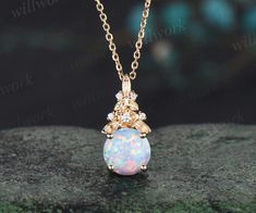 - Metal: Solid gold(14K/18K white/yellow/rose gold),925 sterling silver, platinum available- Main Stone: 6.5mm round lab opal- Accent Stone: diamonds or moissanites- Chain: 16+2 inches. The chain can be adjustable to 18 Inches.- Can be personalized: Yes Gold Opal Jewelry With Prong Setting, Elegant White Gold Opal Jewelry, Gold Opal Jewelry With Round Cut, White Gold Opal Jewelry Gift, Fine Jewelry White Gold Opal, White Gold Opal Jewelry As Gift, White Gold Opal Jewelry For Gift, White Gold Opal Fine Jewelry, Fine Jewelry Opal Round Necklaces