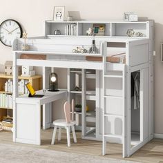 a white loft bed with desk underneath and shelves above it, in front of a wall clock