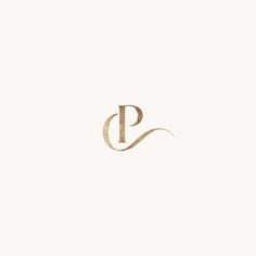 the letter p is made up of gold foil and has a curved shape with an elegant design