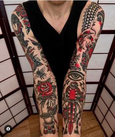 a man with many tattoos on his arms