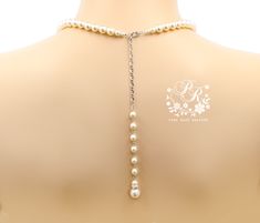 This necklace featuring round Swarovski pearls, AAA Zirconia and platinum plated component. Finished off with a Lobster Clasp and 6 inches Swarovski Pearl backdrop. Finish: Silver Platinum or Rose gold plated Length of necklace: 18.5 inches and 6 inches extender chain. Adornment measures approx. wide 1 3/8 inches, 7/8 inches tall Weight: 68g Items Condition: 100% Brand New Must be made to order with CRYSTALLIZED™ - Swarovski Elements. ~We provided 2 Color of Pearl for you to choose (see pic.10): Adjustable Single Strand Pearl Necklace For Wedding, Silver Single Strand Necklace For Wedding, Adjustable Pearl Pendant Jewelry For Wedding, Pearl White Drop Jewelry For Wedding, White Round Crystal Necklaces For Wedding, White Crystal Necklace For Wedding, White Crystal Necklaces For Wedding, White Bridal Necklace With Adjustable Chain For Anniversary, Silver Single Strand Crystal Necklace For Wedding