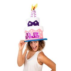 a woman wearing a birthday hat with a cake on it's top that says it's my birthday