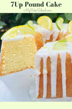 a close up of a cake on a plate with lemons